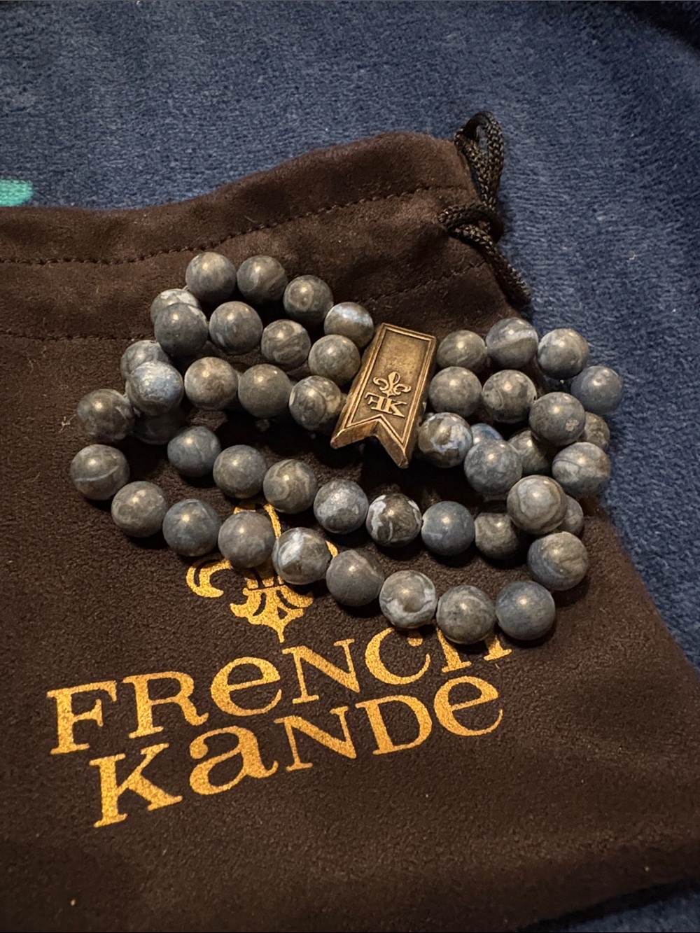 French Kande Blue Beaded Bracelet with Logo Tag